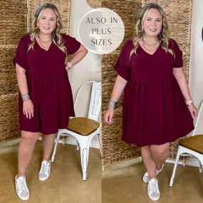 Touring the City V Neck Babydoll Dress in Maroon